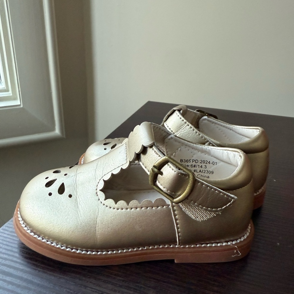 Metallic gold Mary Jane shoe